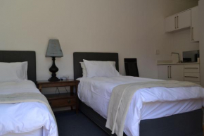 11 Kiaat Suites